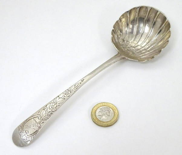 An Irish Silver Sauce Ladle With Shell Formed Bowl And