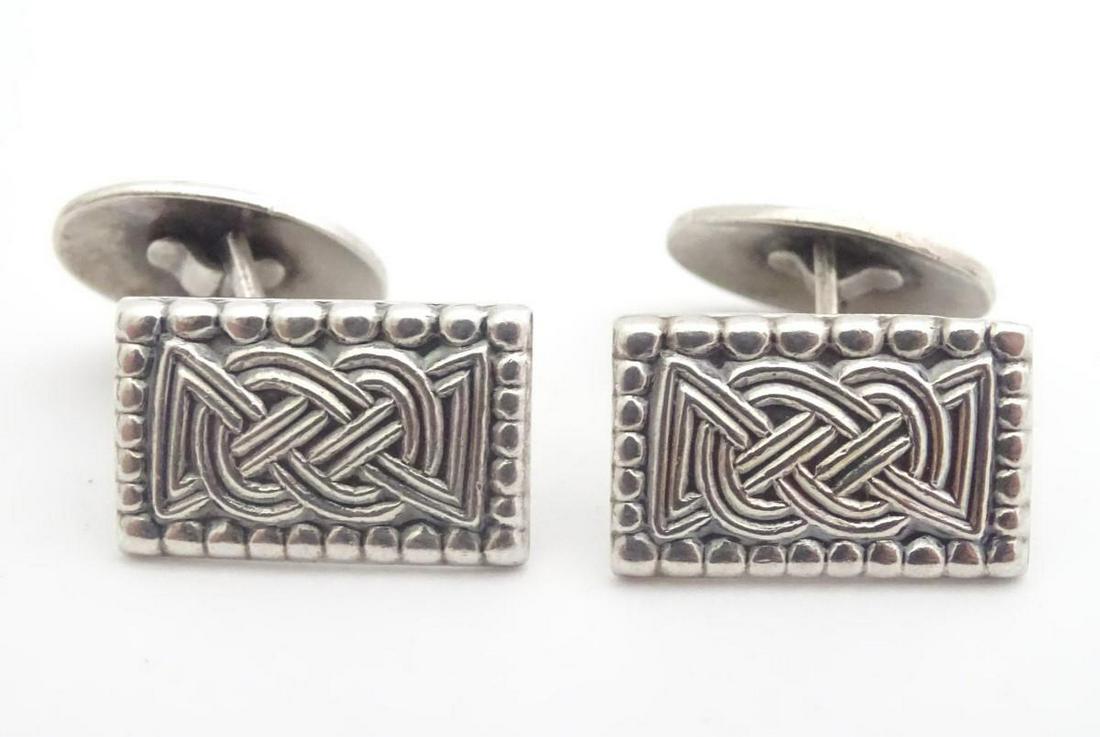 Norwegian silver cufflinks with celtic style design,: Norwegian silver cufflinks with celtic style design, based on an archaeological find from 850 AD. Marked to reverse 'Osebergfunnet Kopi Ca. 850 E KR' Maker David Andersen, Norway.