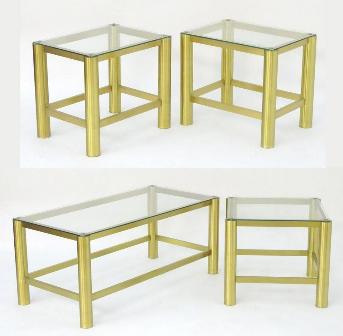 A collection of brass and glass coffee tables,: A collection of brass and glass coffee tables, comprising a pair of end tables, a long rectangular coffee table and a square coffee table. 42 1/2" long x 21" wide x 18" high. (Rectangular). 20 1/2" lo