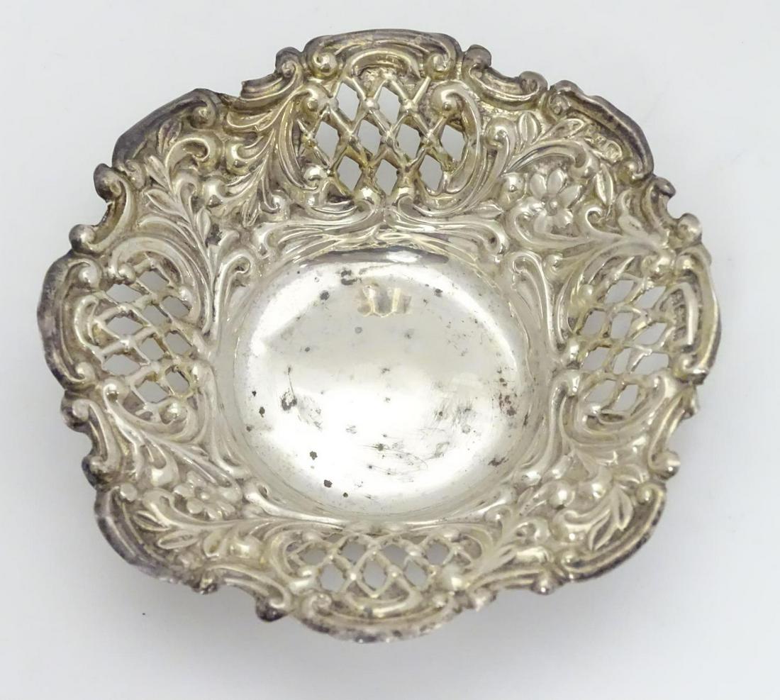 A silver bonbon dish with pierced decoration.: A silver bonbon dish with pierced decoration. Hallmarked Birmingham 1901 maker Henry Matthews. Approx. 3 1/4" wide