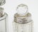 Three glass scent bottles with silver lids/collars. - 3