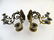 Lighting: a pair of early 20thC triple wall sconces, of - 2
