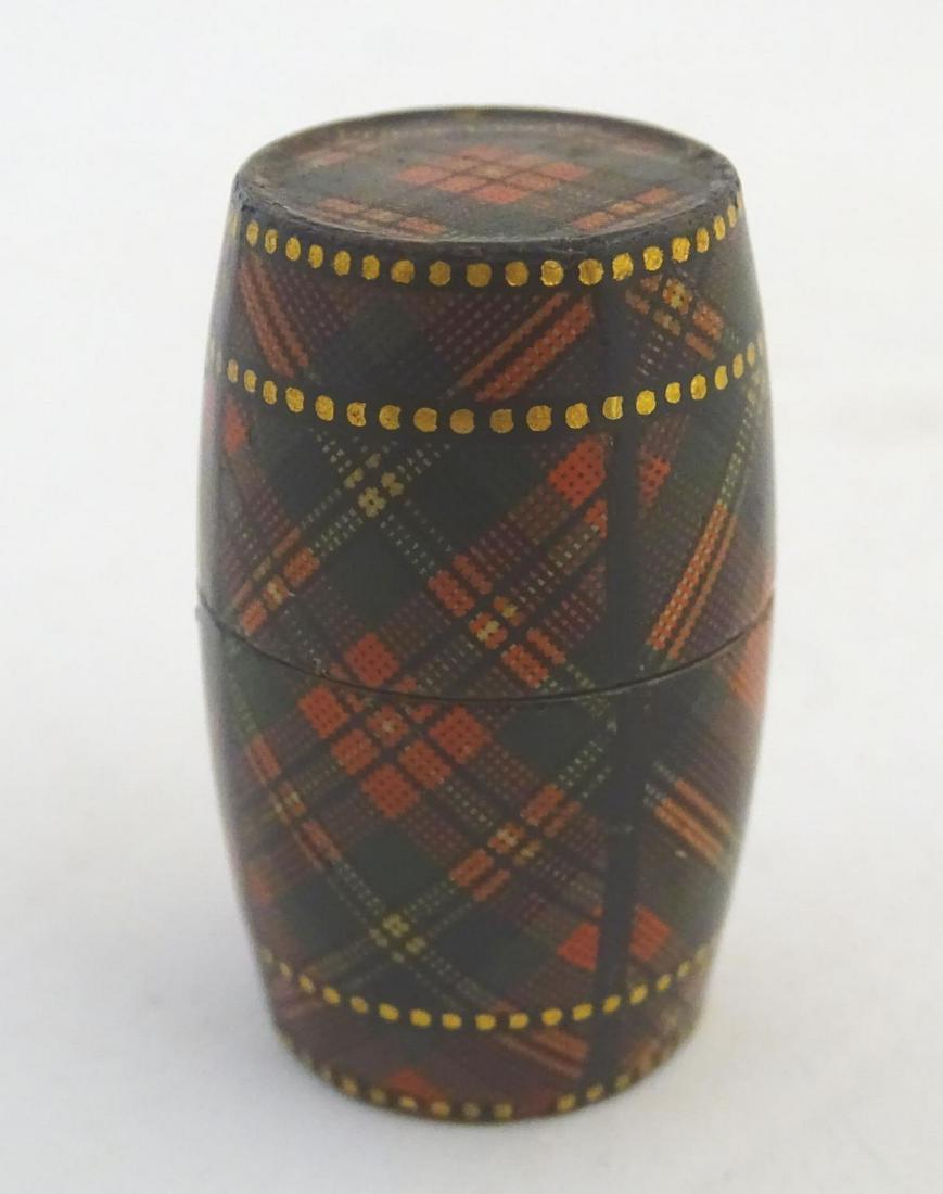 A 19thC tartan ware thimble box / barrel, marked Prince: A 19thC tartan ware thimble box / barrel, marked Prince Charles to top. Approx. 1 3/4"