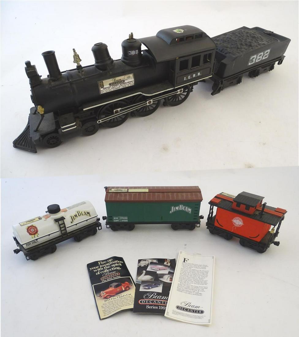 A collection of novelty advertising decanters for Jim: A collection of novelty advertising decanters for Jim Beam bourbon whiskey, one formed as a steam train and a further three formed as railroad cars, the largest approximately 10" long (4)