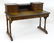 A late 19thC Aesthetic movement desk by Gillows of