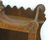 A c.1936 oak hanging shelf with a carved frame, walnut - 6
