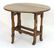 A late 19thC oak gateleg table, having drop flaps - 4