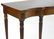An early 20thC mahogany sideboard with a shaped top, a - 4