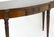 An early 20thC mahogany sideboard with a shaped top, a - 5