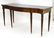 An early 20thC mahogany sideboard with a shaped top, a - 9