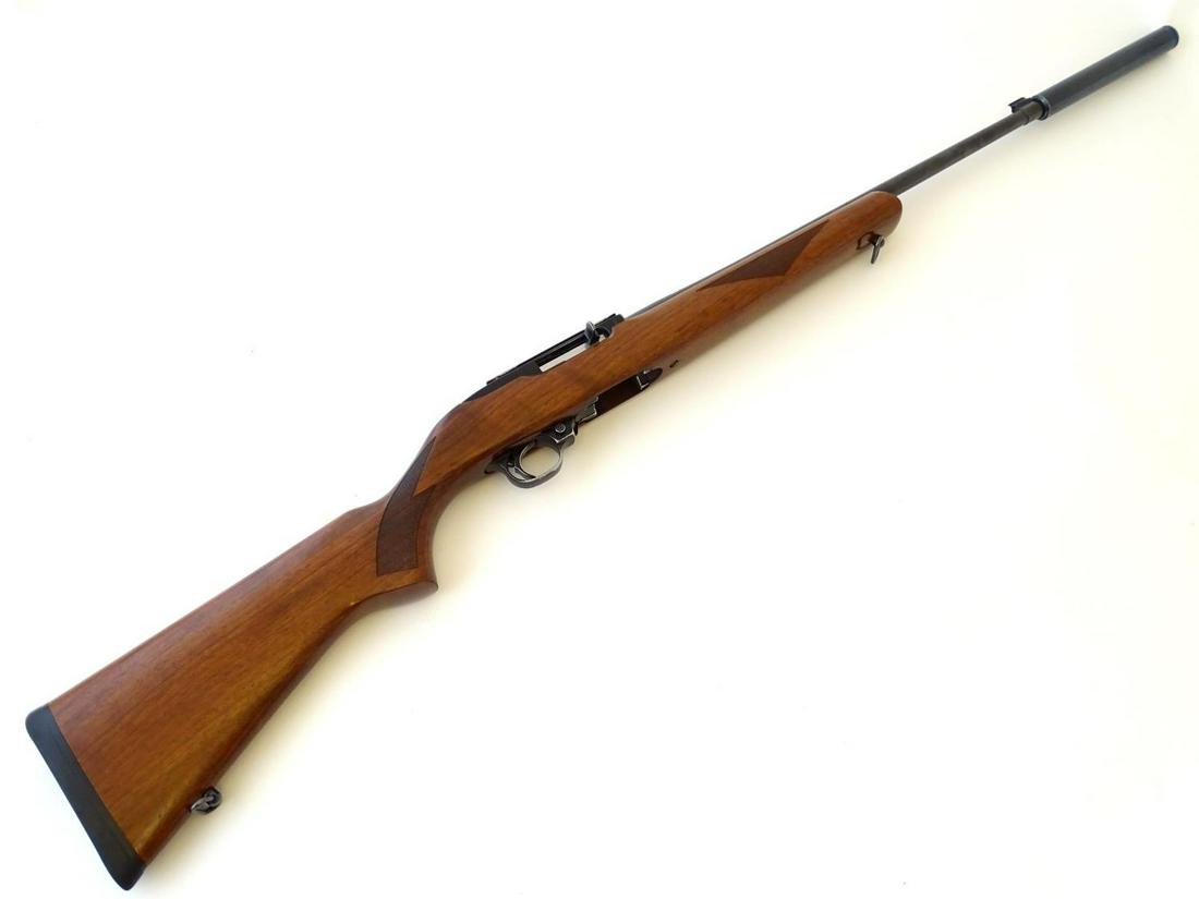 Rimfire rifle: a Ruger '10/22 Carbine' .22LR semi: Rimfire rifle: a Ruger '10/22 Carbine' .22LR semi automatic rifle, 25" barrel (including sound moderator), figured walnut stock (chequered) with sling swivels. Serial number 241-62493Please note: rele