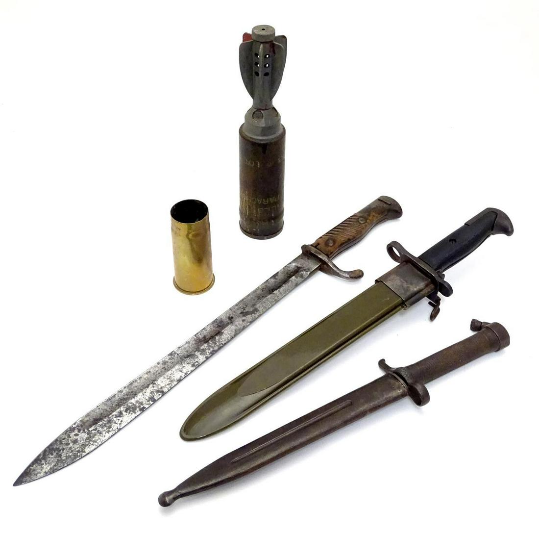 Militaria : an assortment of 20thC military: Militaria : an assortment of 20thC military memorabilia, comprising a WWI Imperial German bayonet by Fichtel & Sachs, Schweinfurt, a WWII US 'M1 M1943' bayonet with sheath (dated 1943) and a Swedish E