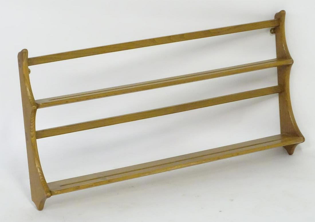 Vintage retro, mid-century: an Ercol floating wall: Vintage retro, mid-century: an Ercol floating wall shelf / plate rack, constructed from elm and beech, 42" wide, 20" tall, protruding 5"