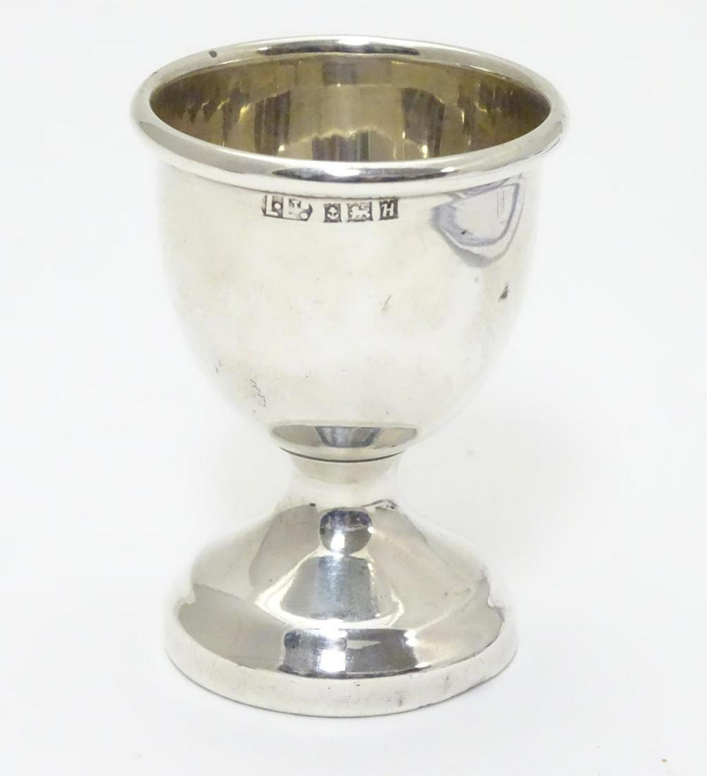 A silver pedestal egg cup hallmarked Birmingham 1957: A silver pedestal egg cup hallmarked Birmingham 1957 maker Lanson Ltd. 2 1/4" high
