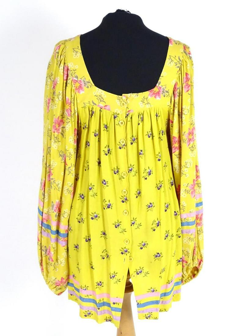 A vintage Jeff Banks, London, smock top in a mustard: A vintage Jeff Banks, London, smock top in a mustard colour, c1980's. Bust size 38" approx. UK size 12