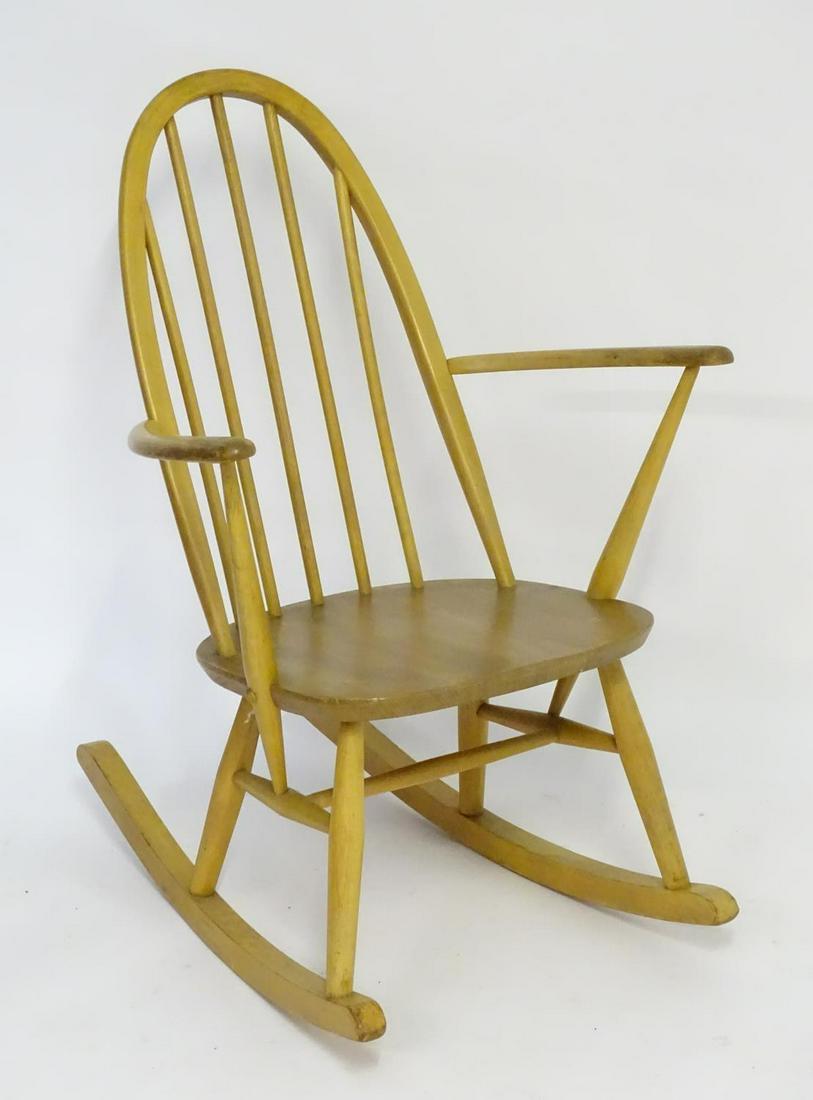 Vintage retro, mid-century: an Ercol Quaker model 428: Vintage retro, mid-century: an Ercol Quaker model 428 rocking chair, constructed of elm and beech, 33 3/4" tall, 24" wide