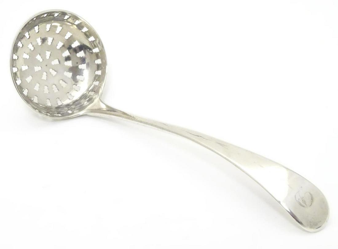 A silver old English pattern sifting spoon, hallmarked: A silver old English pattern sifting spoon, hallmarked London 1801 maker Peter, Ann and William Bateman. Approx. 6" long