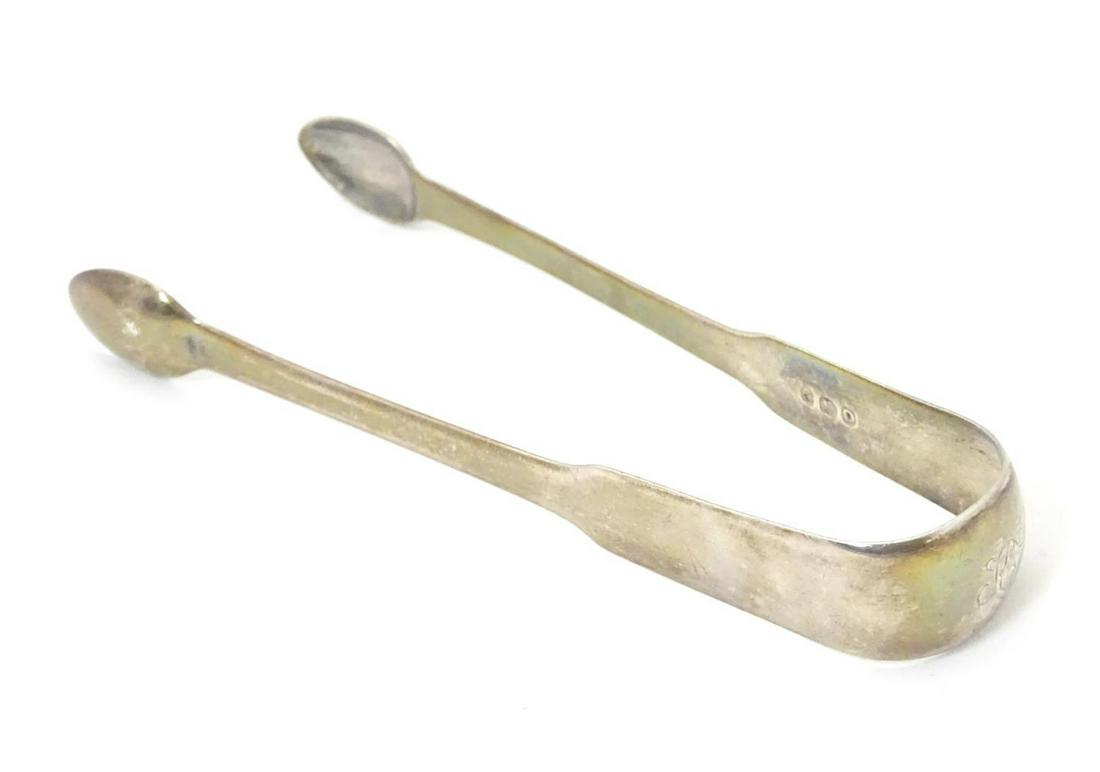 Geo III silver fiddle pattern sugar tongs, hallmarked: Geo III silver fiddle pattern sugar tongs, hallmarked London 1809, maker Sarah & John William Blake. Approx. 5" long