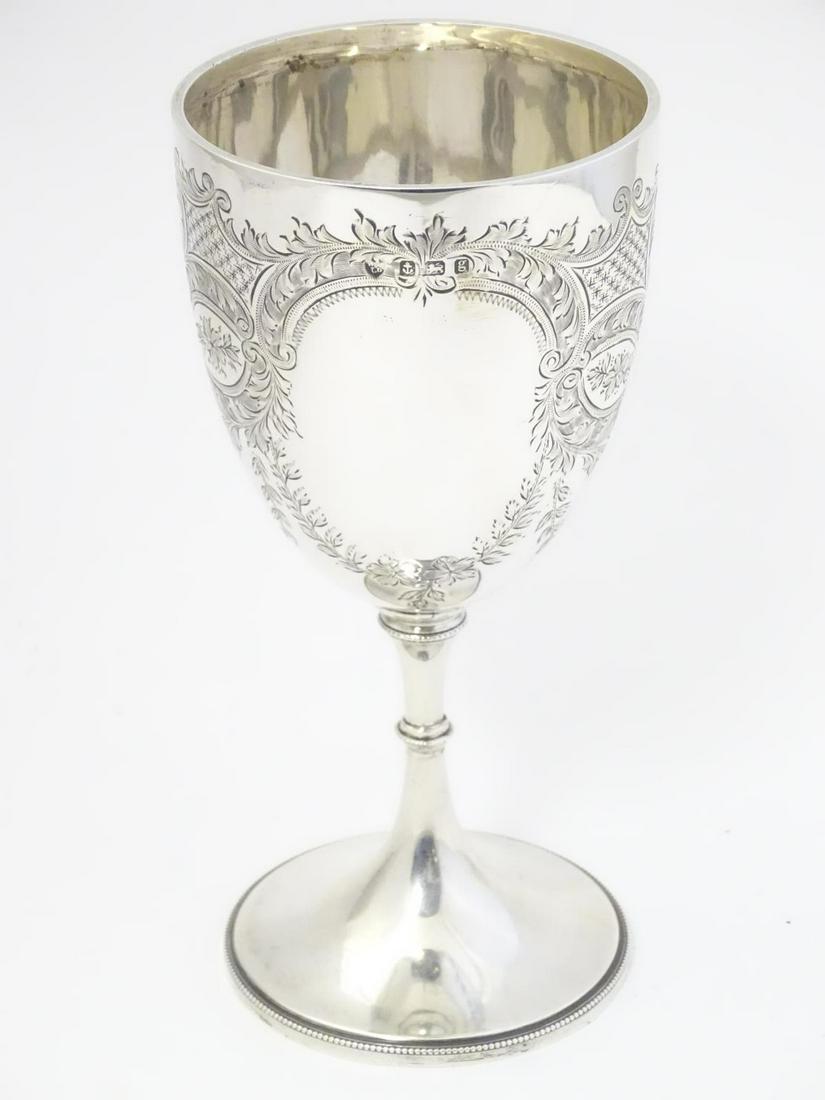 A silver cup of goblet / chalice form hallmarked: A silver cup of goblet / chalice form hallmarked Birmingham 1906 maker Williams (Birmingham) Ltd.