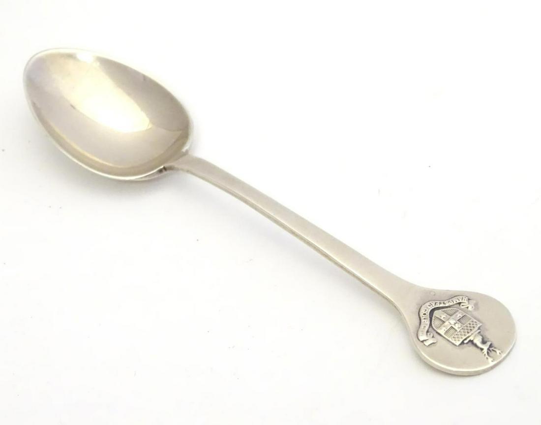 A silver teaspoon with crest to handle titled Hampstead: A silver teaspoon with crest to handle titled Hampstead Golf Club, hallmarked Sheffield 1929, maker Cooper Bros & Sons Ltd. 4 1/4" long Category Silver & Silver-plated items