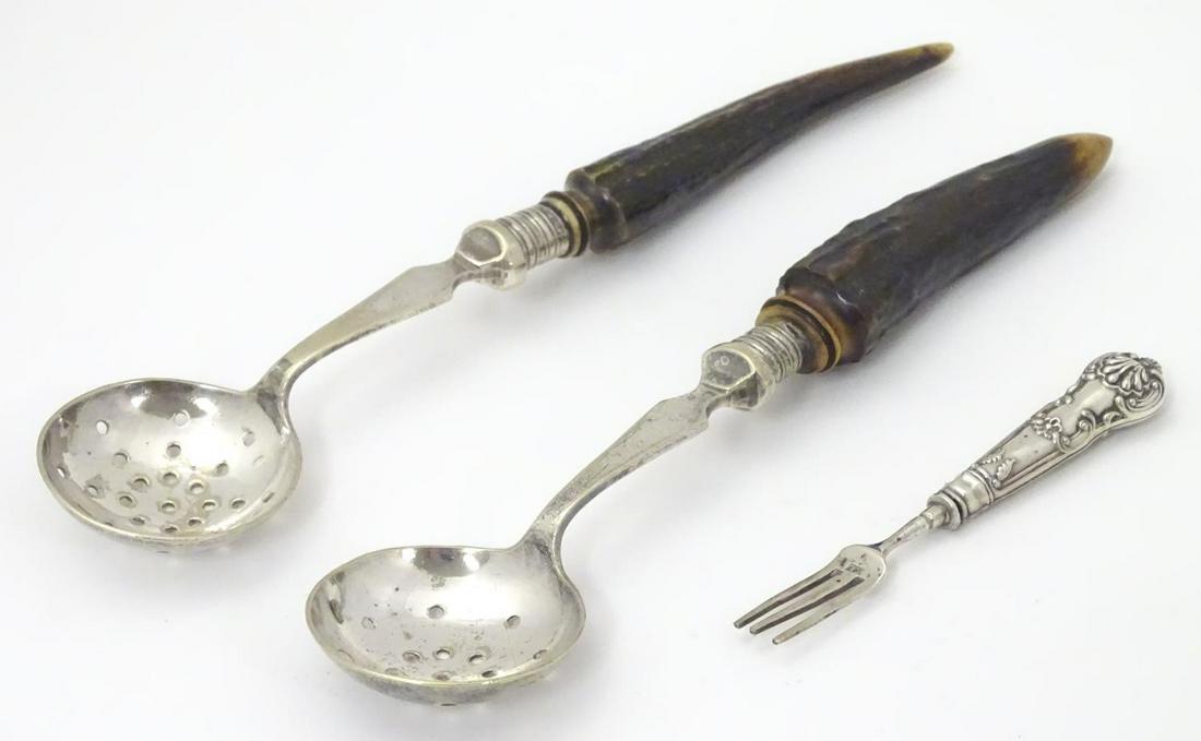 Two silver plate strainer spoons with antler handles, (1 of 8)