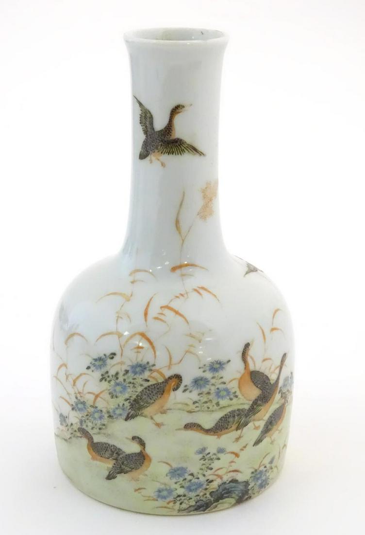 A Chinese bottle vase decorated with a landscape scene (1 of 5)