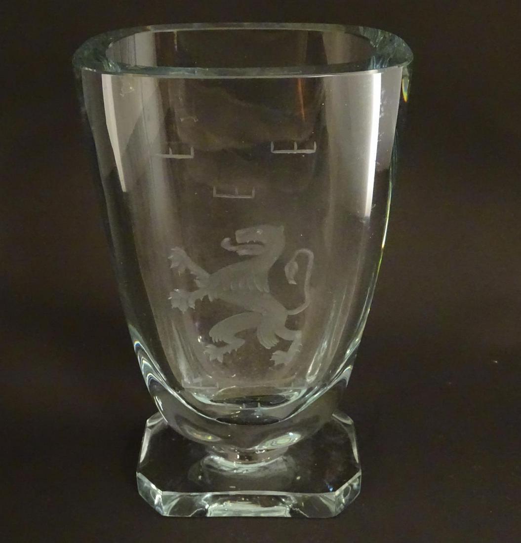 A Scandinavian glass vase with engraved rampant lion: A Scandinavian glass vase with engraved rampant lion decoration. In the manner of Elis Bergh for Kosta Boda Sweden. Approx 7 3/4" high