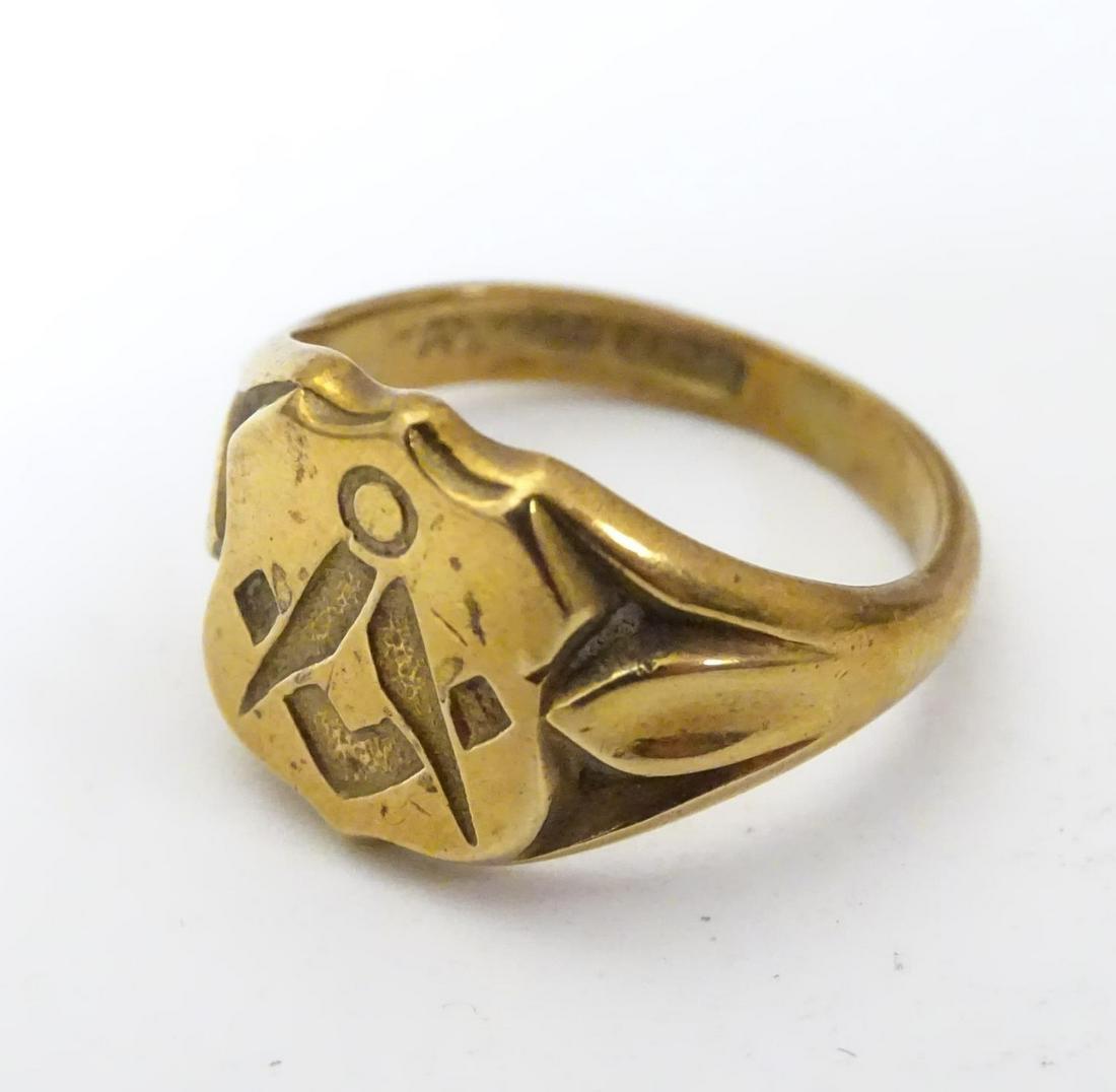 Masonic Interest : A gold plated signet ring with: Masonic Interest : A gold plated signet ring with Masonic symbol to top. Ring size approx. N