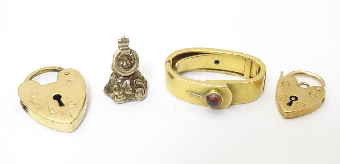 Four assorted items to include a gilt metal pendant fob (1 of 7)