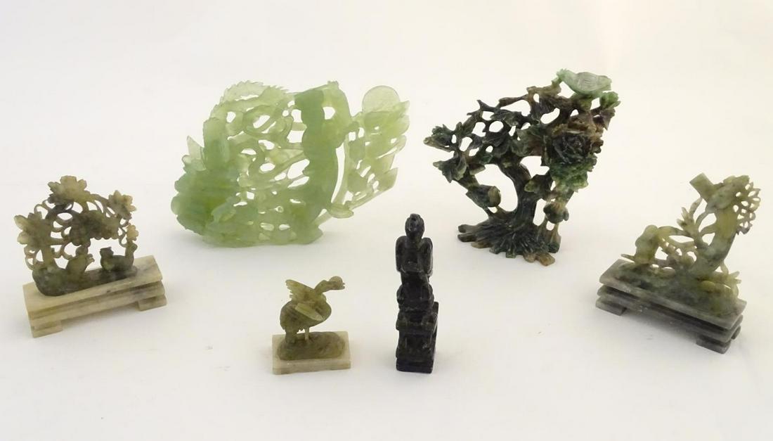 A quantity of Oriental soapstone carvings comprising a (1 of 10)