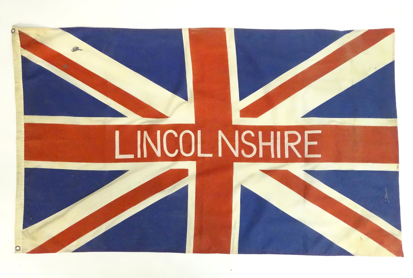 A mid 20thC Union flag, with applied stencil: A mid 20thC Union flag, with applied stencil 'Lincolnshire' , 60" wide x 36" tall