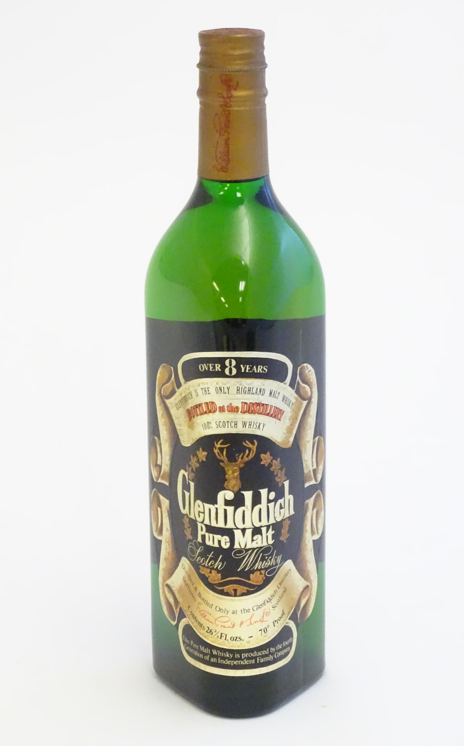 A bottle of Glenfiddich Pure Malt Scotch Whisky, 26 2/3 (1 of 8)