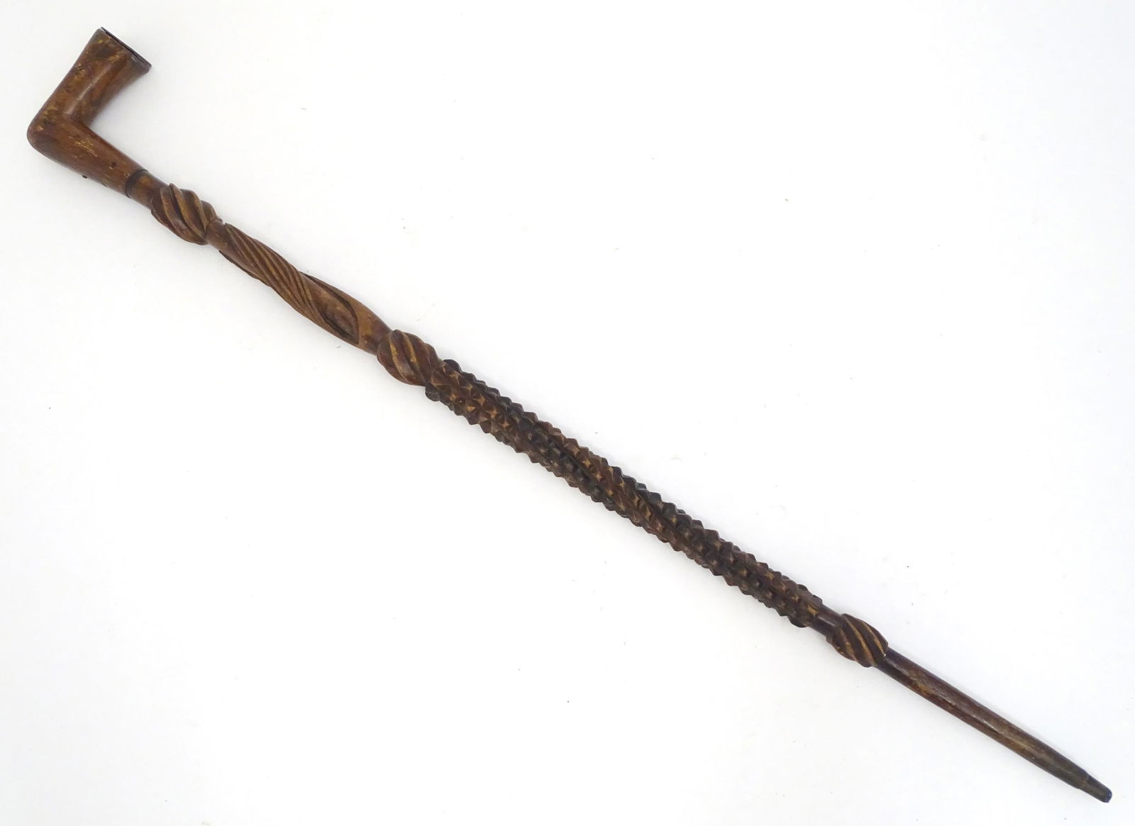 A Victorian carved wooden walking stick / cane with: A Victorian carved wooden walking stick / cane with plaque to handle engraved John Williams, Tredegar, 1875. Approx. 34 1/2"