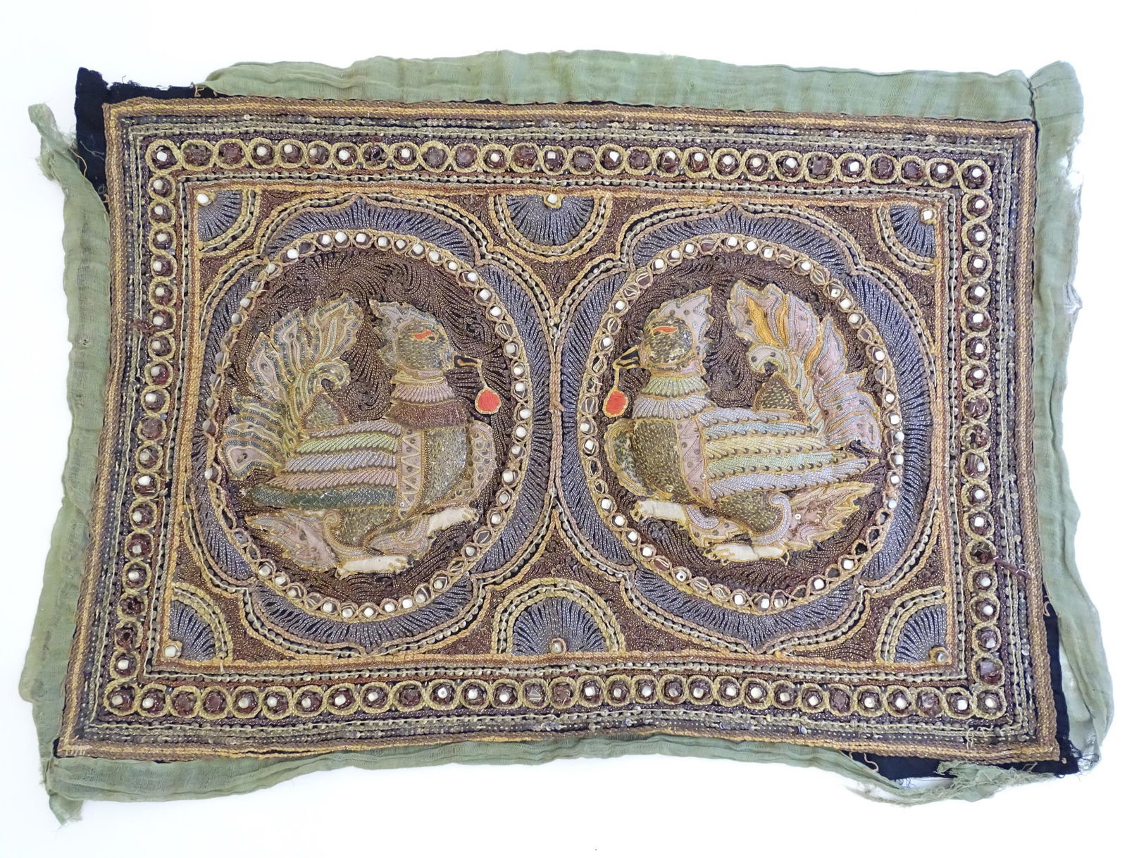 A Burmese embroidered tapestry / textile panel with (1 of 3)