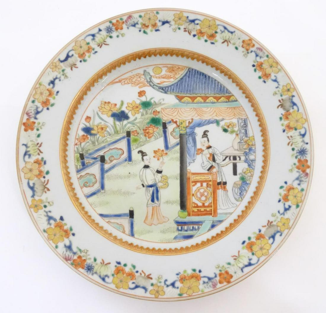 A Chinese plate depicting two ladies in a garden (1 of 6)
