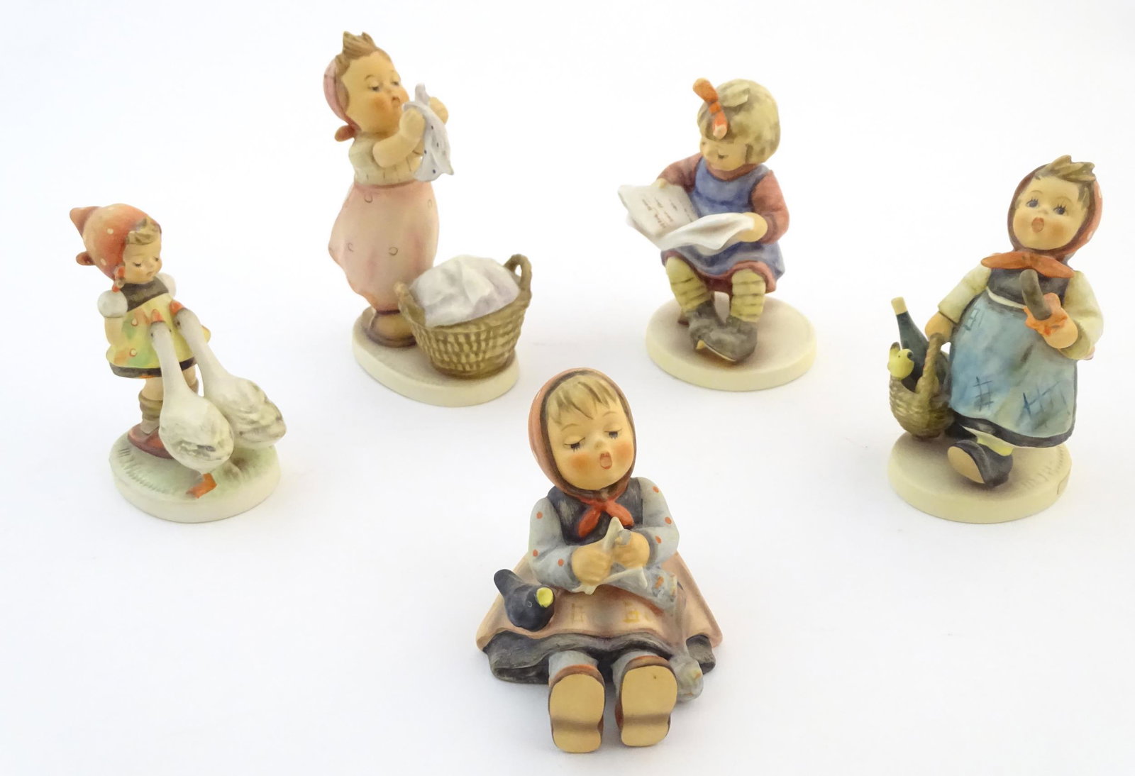 Five Hummel / Goebel figures comprising Happy Pastime, (1 of 7)