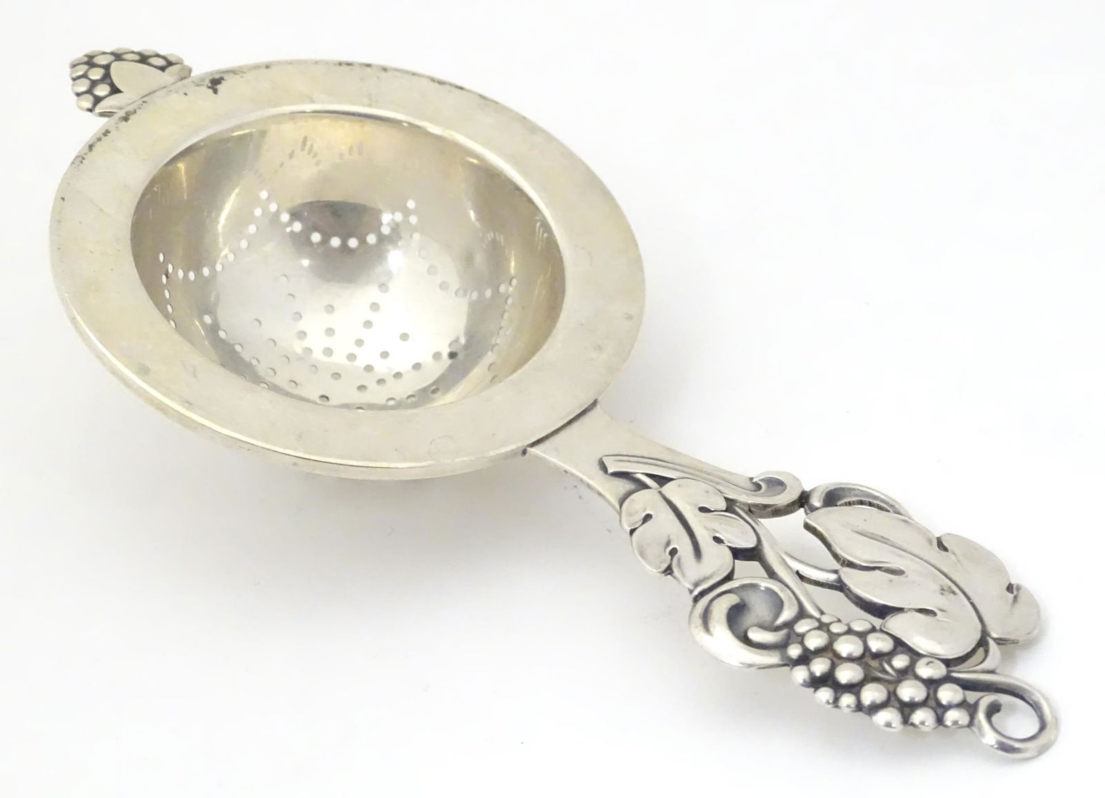 Scandinavian silver : A silver strainer with styles (1 of 5)