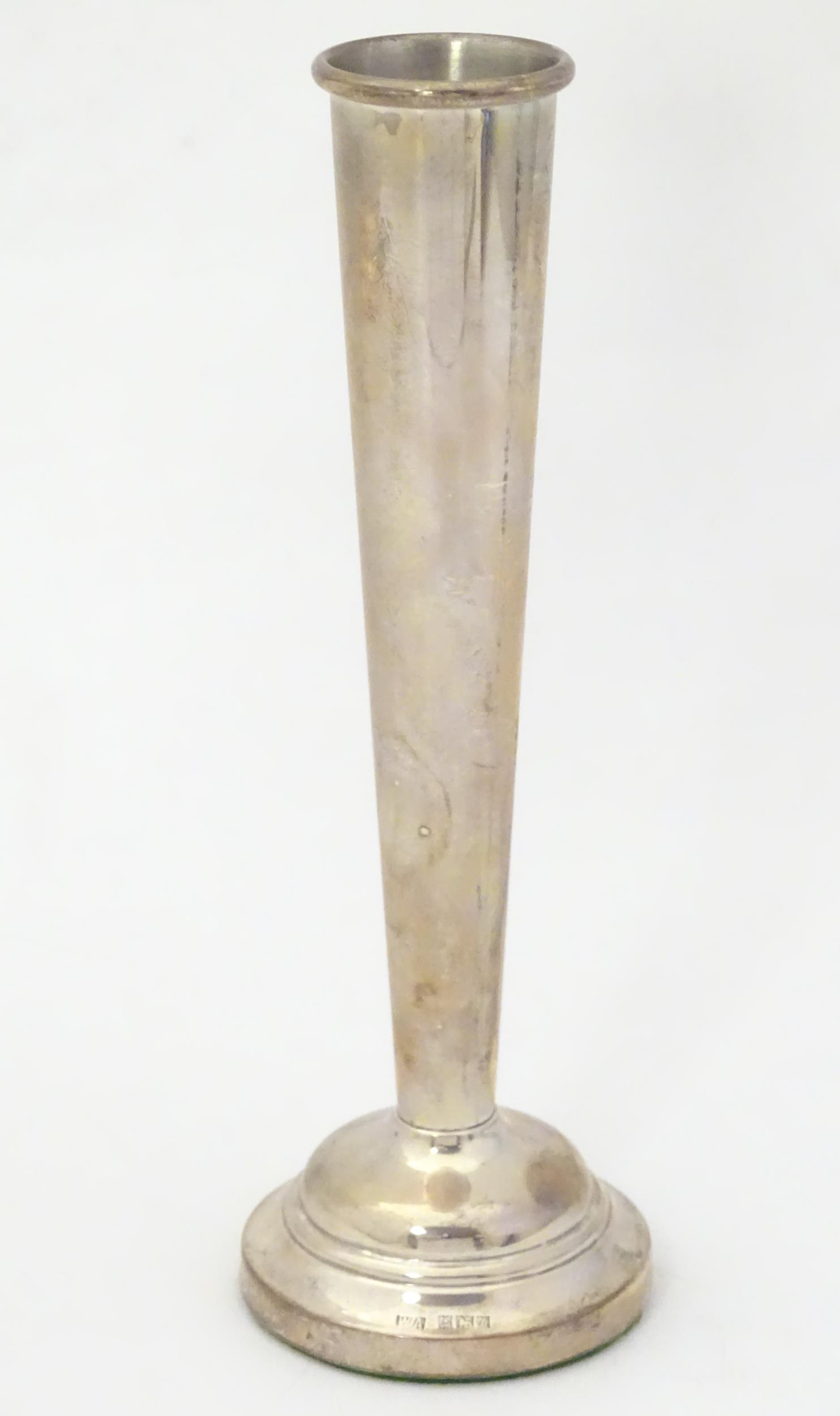 A silver bud vase, hallmarked Birmingham 1960 maker: A silver bud vase, hallmarked Birmingham 1960 maker William Adams Ltd. 7" high