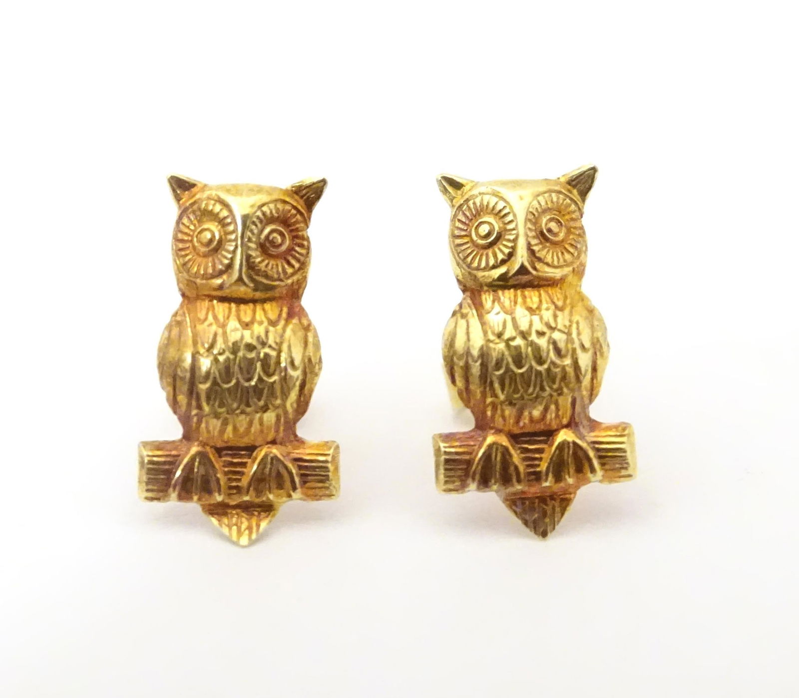 A pair of 9ct gold stud earrings formed as owls. Approx (1 of 9)