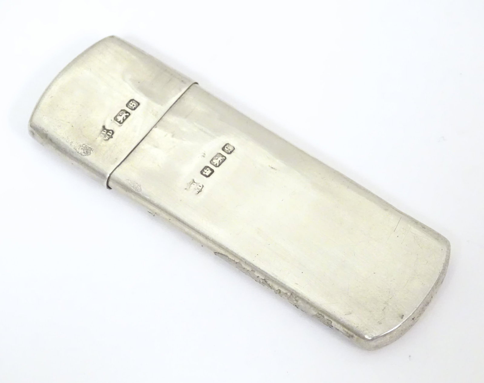 A silver two sectional container of slim form,: A silver two sectional container of slim form, hallmarked Sheffield 1910, maker James Deakin & Sons. Approx. 2 3/4" long