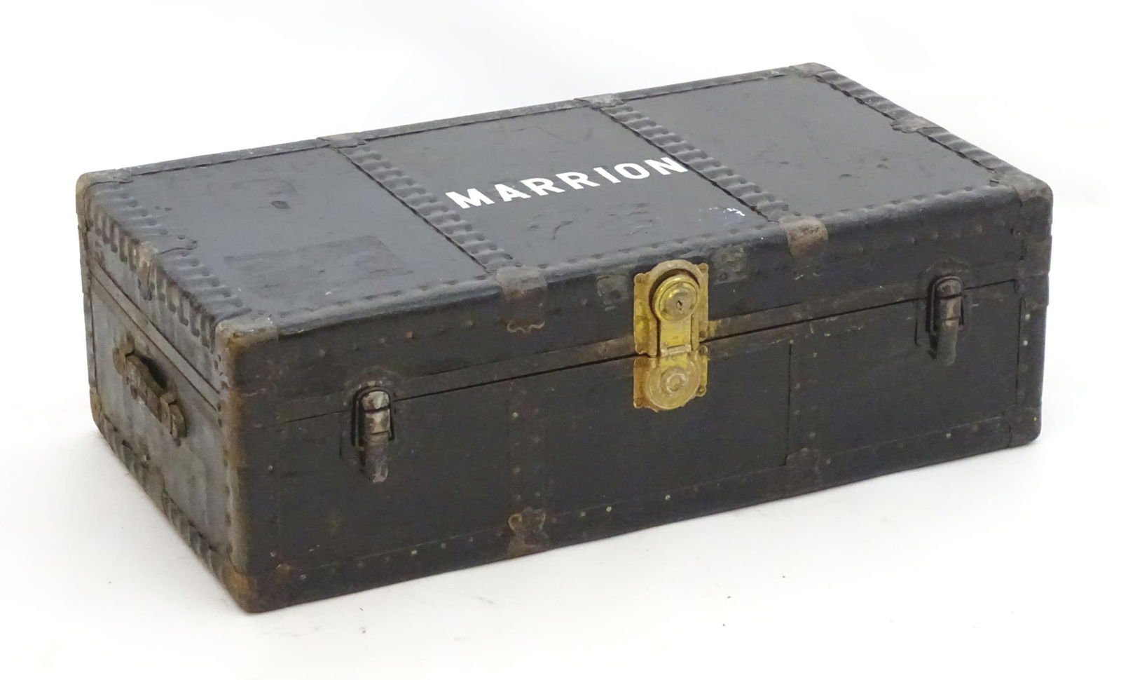 A mid 20thC transit case / shipping trunk with steel: A mid 20thC transit case / shipping trunk with steel reinforcements, carrying handles and a black painted finish. 39" long x 21" wide x 12" high.