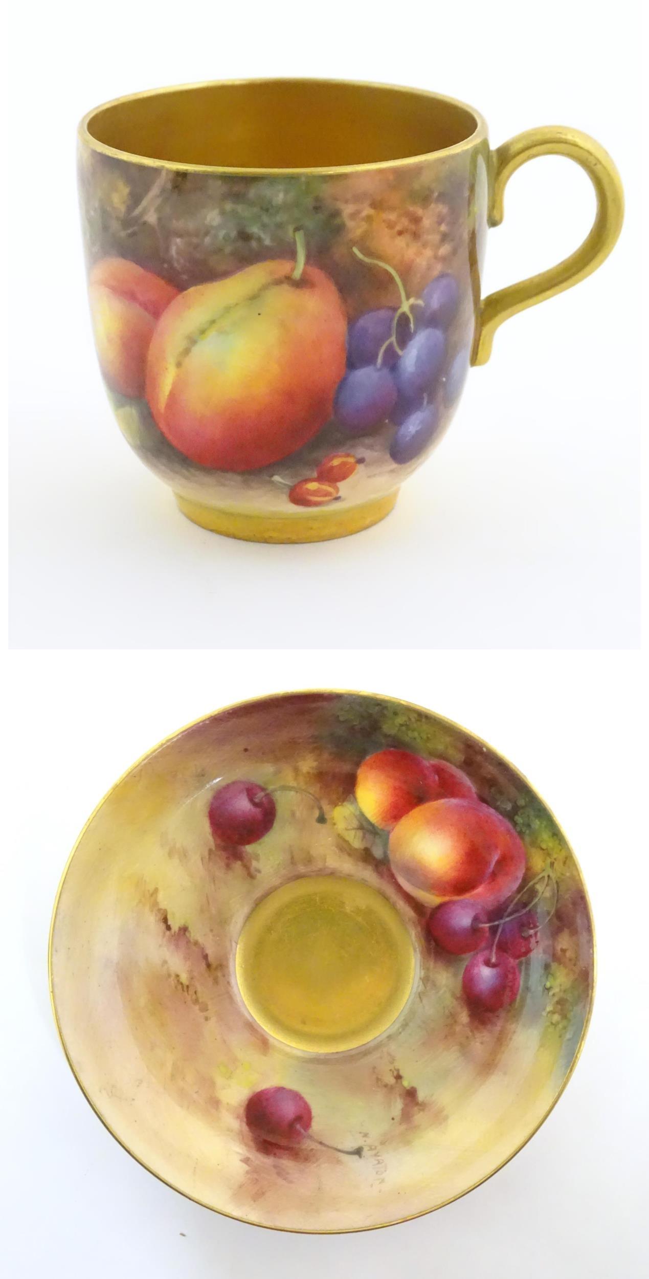 A Royal Worcester tea cup with painted decoration (1 of 13)