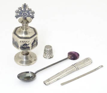 Assorted silver and white metal items to include a: Assorted silver and white metal items to include a small hallmarked silver thimble, a coffee spoon set with amethyst hardstone detail to handle, hallmarked Birmingham 1923 maker William Suckling Ltd,