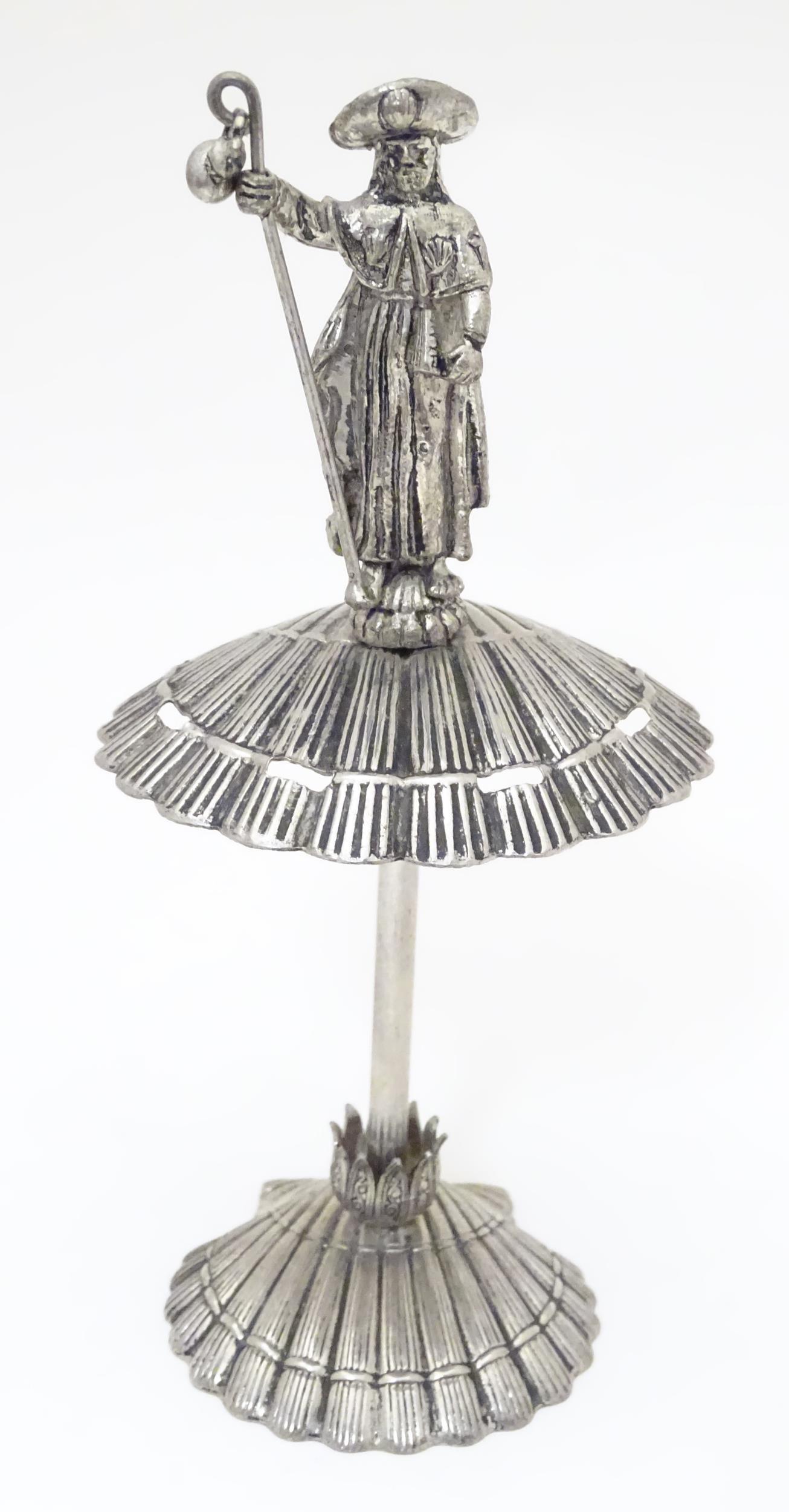 A Continental white metal souvenir hatpin stand with (1 of 6)