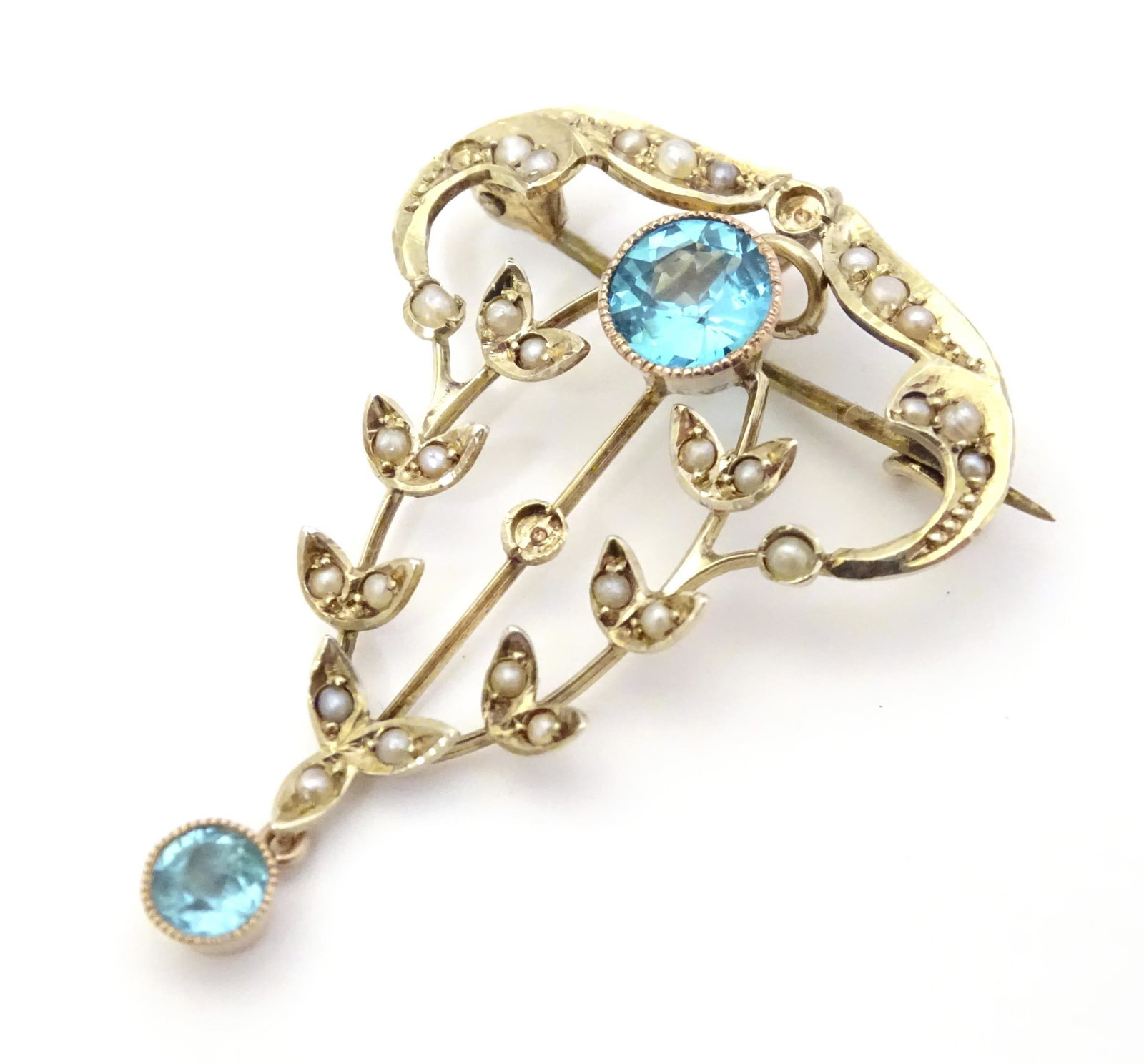 An Art Nouveau yellow metal brooch / pendant set with (1 of 5)