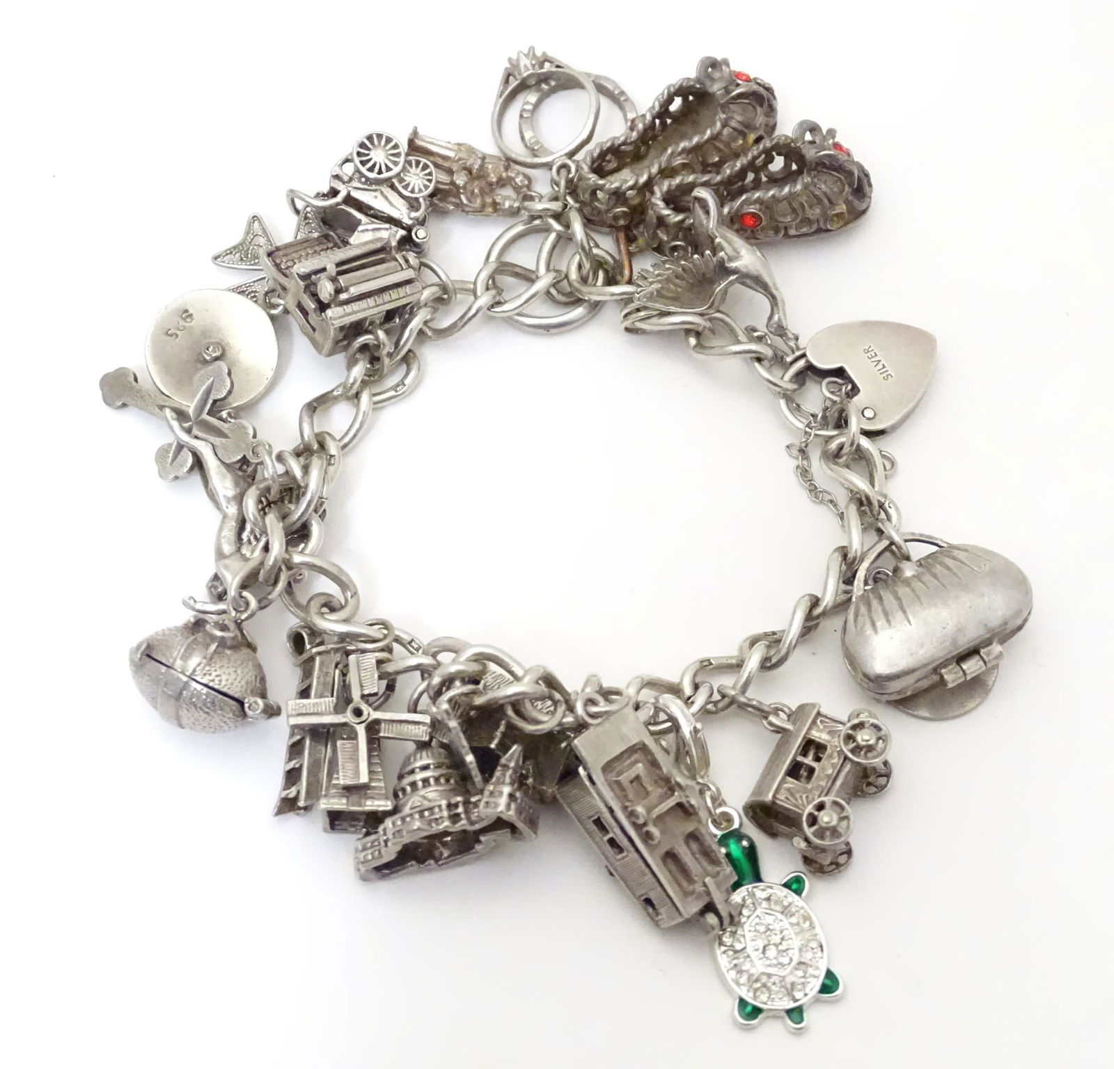 A silver and white metal charm bracelet set with 19 (1 of 10)