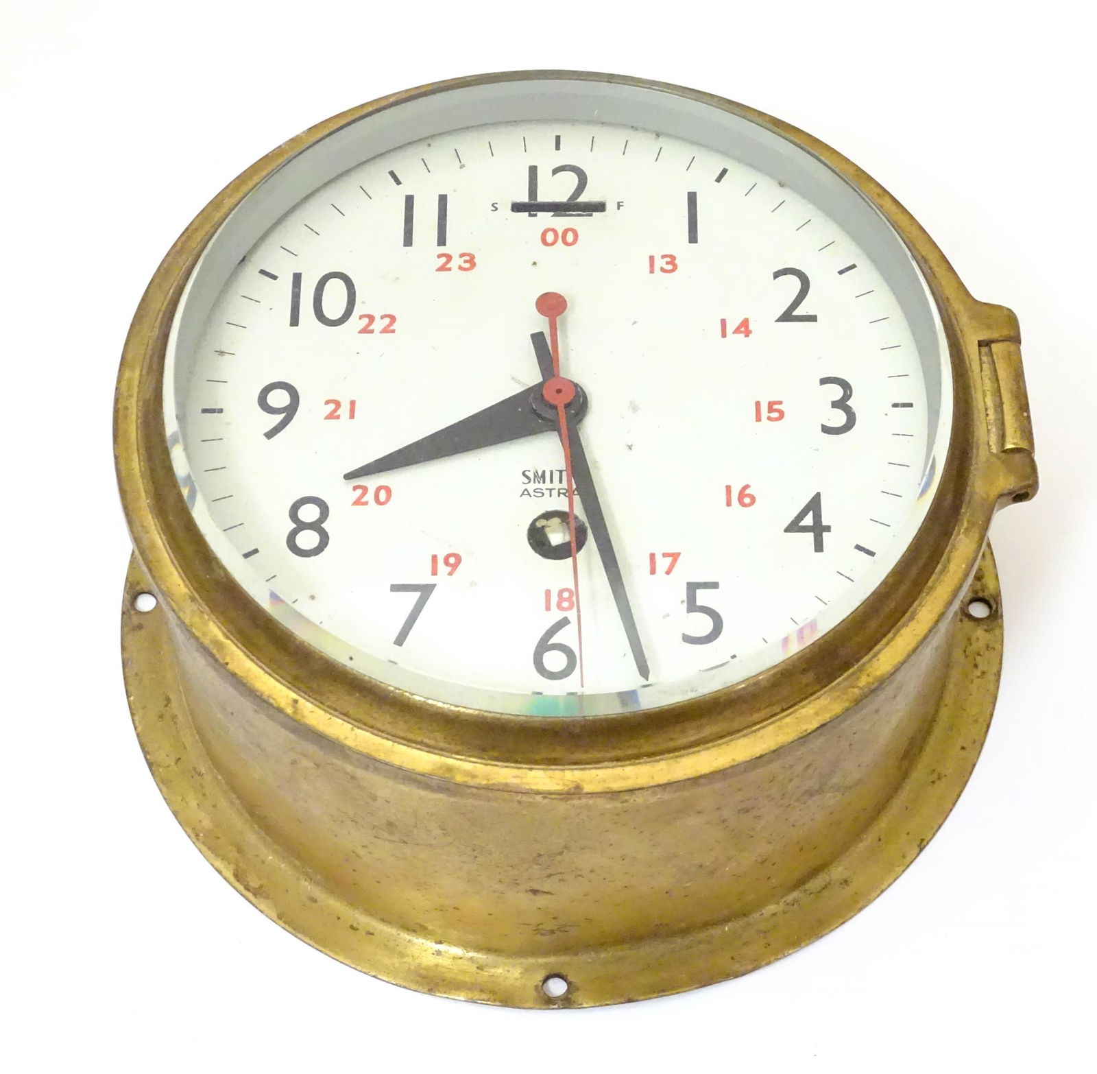 A Smiths Astral maritime / bulkhead clock the dial with: A Smiths Astral maritime / bulkhead clock the dial with black Arabic numbers to outer and red 24 hour format Arabic numbers inner. Approx 7 1/2" diameter