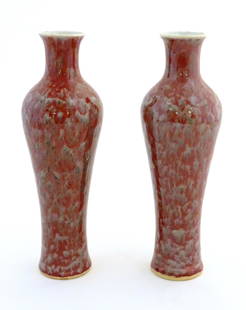 A pair of Chinese vases of elongated form decorated with a mottled glaze. Double ring mark under.: A pair of Chinese vases of elongated form decorated with a mottled glaze. Double ring mark under. Approx. 12" high (2)