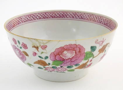 A Chinese bowl decorated with flowers and foliage, with floral motif to centre of interior and: A Chinese bowl decorated with flowers and foliage, with floral motif to centre of interior and banded border. Approx. 3 5/8" high x 7 3/4" diameter