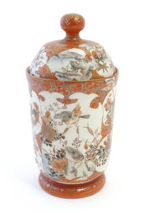 A Japanese kutani pot and cover with panelled decoration depicting landscapes, birds, flowers, etc.: A Japanese kutani pot and cover with panelled decoration depicting landscapes, birds, flowers, etc. Character marks under. Approx. 6 3/4" high